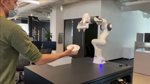 Reactive Human-to-Robot Handovers of Arbitrary Objects